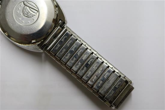 A gentlemans steel Omega Constellation wrist watch and two other watches.